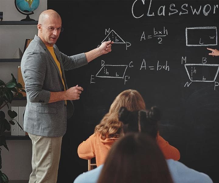 Math teacher teaching to a class
