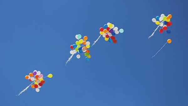 groups of balloons in the sky