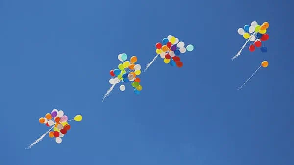 groups of balloons in the sky