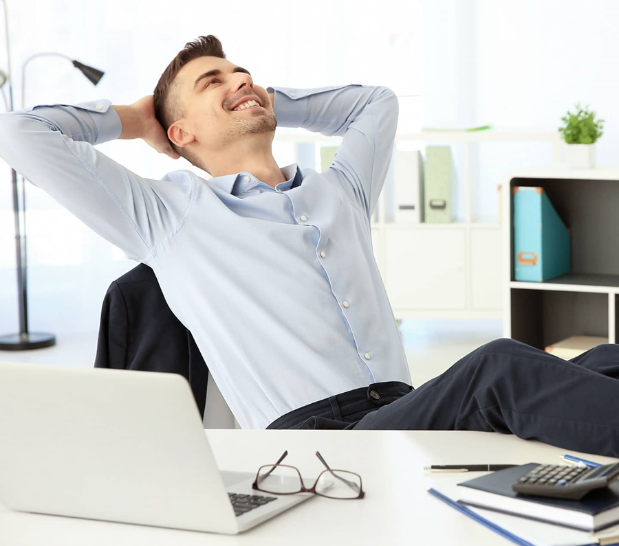 Young man resting from work at desk